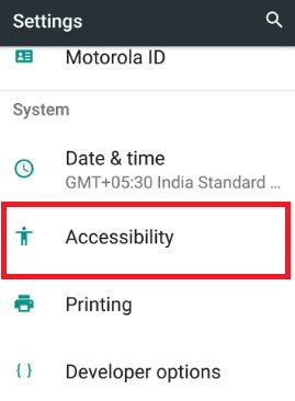 Toque em acessibilidade na seção do sistema nas configurações do telefone